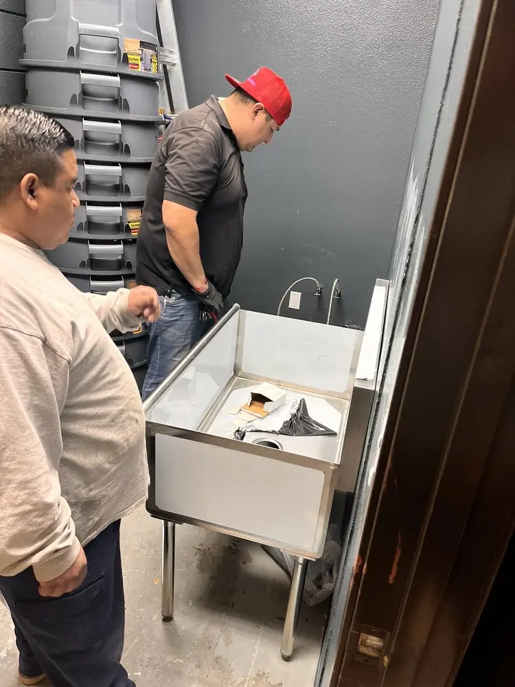 Commercial plumbing and sink installation in Kenneys